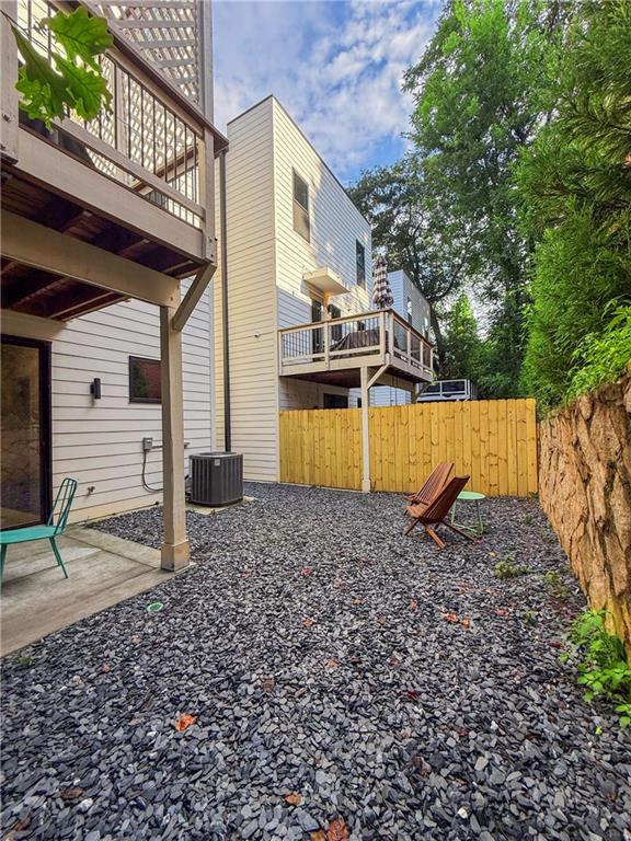 825 Barnett Street Northeast Atlanta, GA 30306 - Photo 24 of 44 a view of a house with a backyard