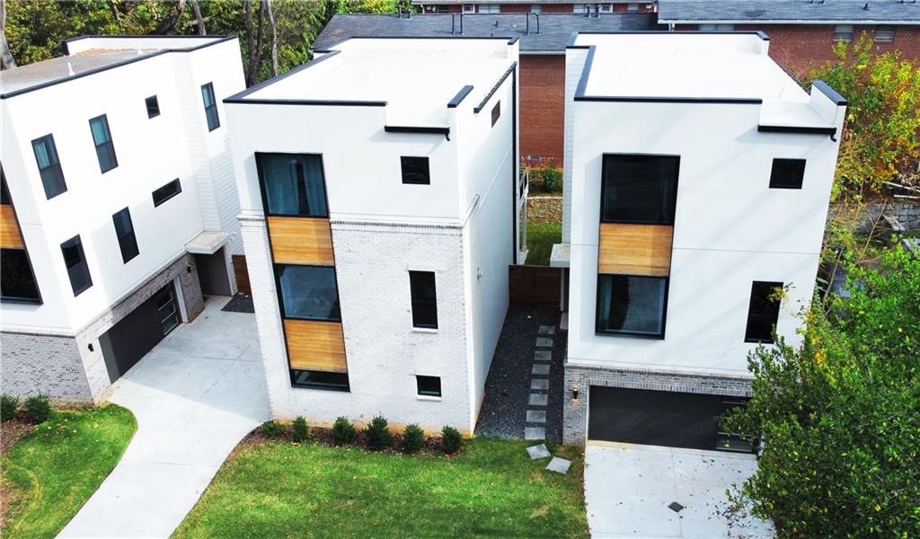 825 Barnett Street Northeast Atlanta, GA 30306 - Photo 26 of 44 a view of house with backyard