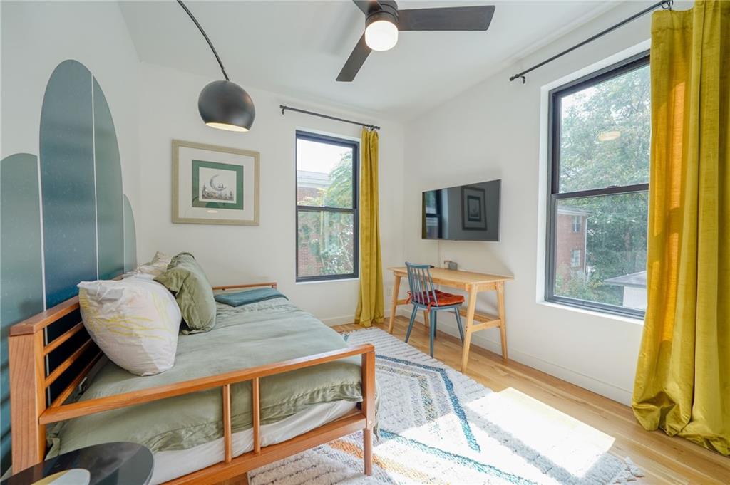 825 Barnett Street Northeast Atlanta, GA 30306 - Photo 30 of 44 a living room with furniture and a flat screen tv
