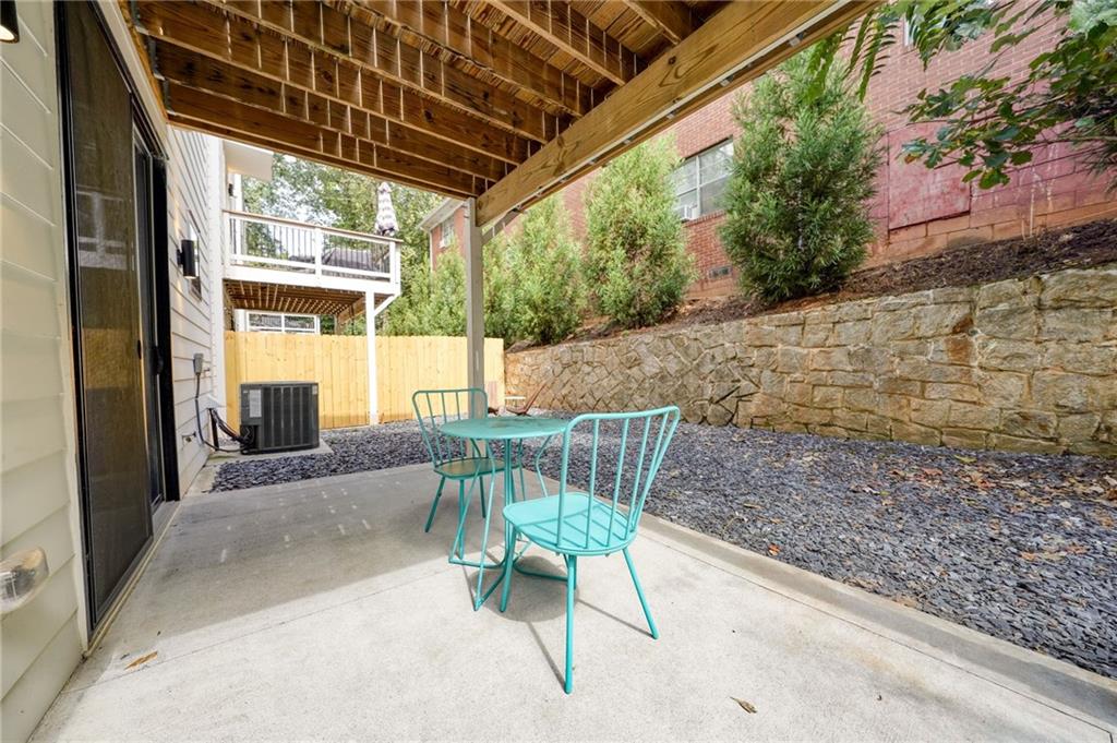 825 Barnett Street Northeast Atlanta, GA 30306 - Photo 39 of 44 a view of a chairs and table in the patio