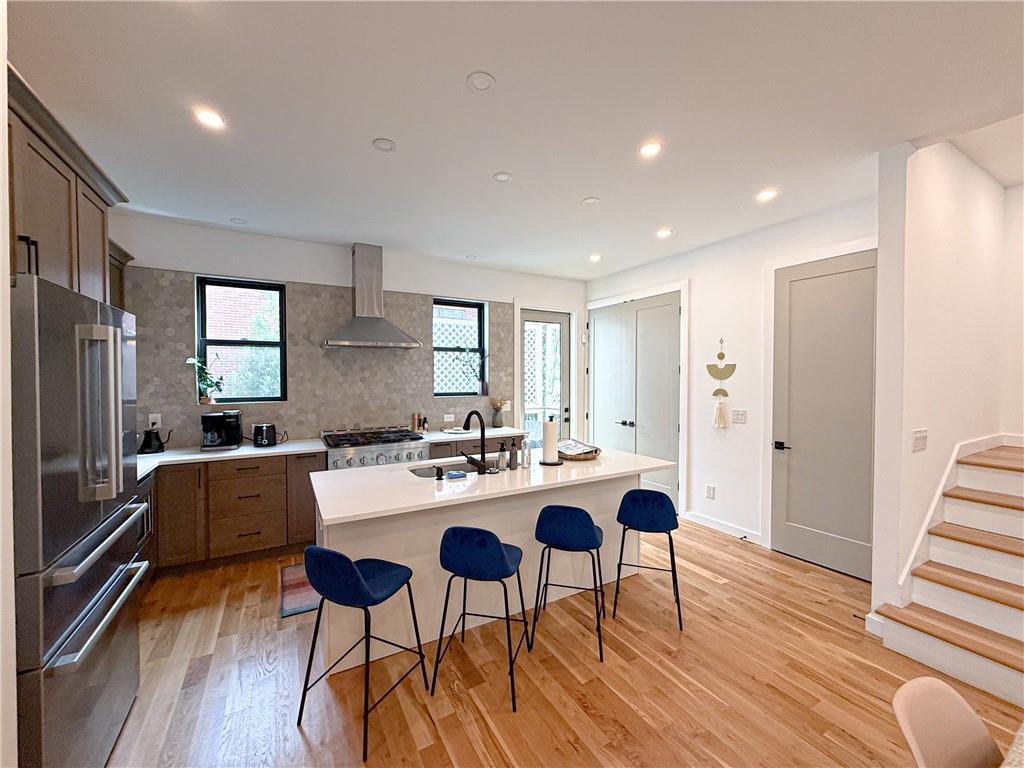 825 Barnett Street Northeast Atlanta, GA 30306 - Photo 7 of 44 a view of a dining room with furniture and wooden floor