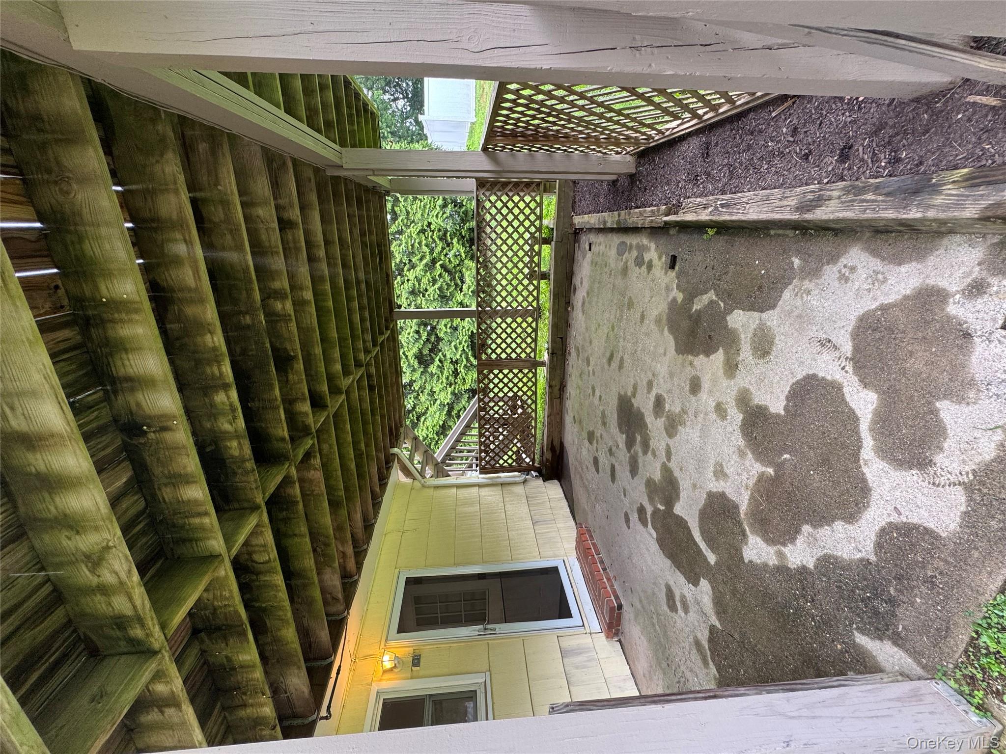 1145 Glen Road, Unit B Shrub Oak, NY 10588 - Photo 12 of 13 View of patio / terrace with an attached carport