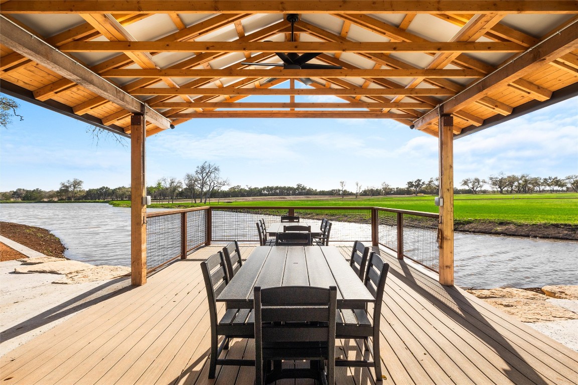 3516 Mt Sharp Road, Unit 23 Wimberley, TX 78676 - Photo 28 of 40 a view of a balcony with lake view and a floor to ceiling window