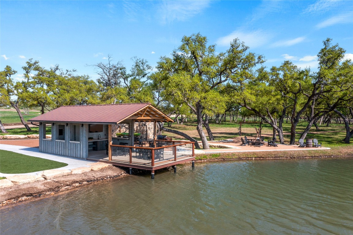 3516 Mt Sharp Road, Unit 23 Wimberley, TX 78676 - Photo 30 of 40 a view of a swimming pool with a patio