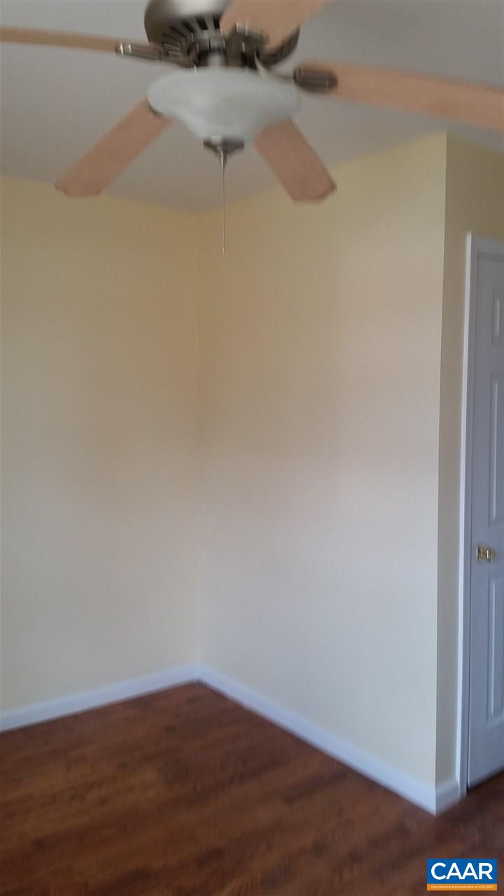 575 Resettlement Road Madison, VA 22727 - Photo 14 of 18 a view of a small space with wooden floor