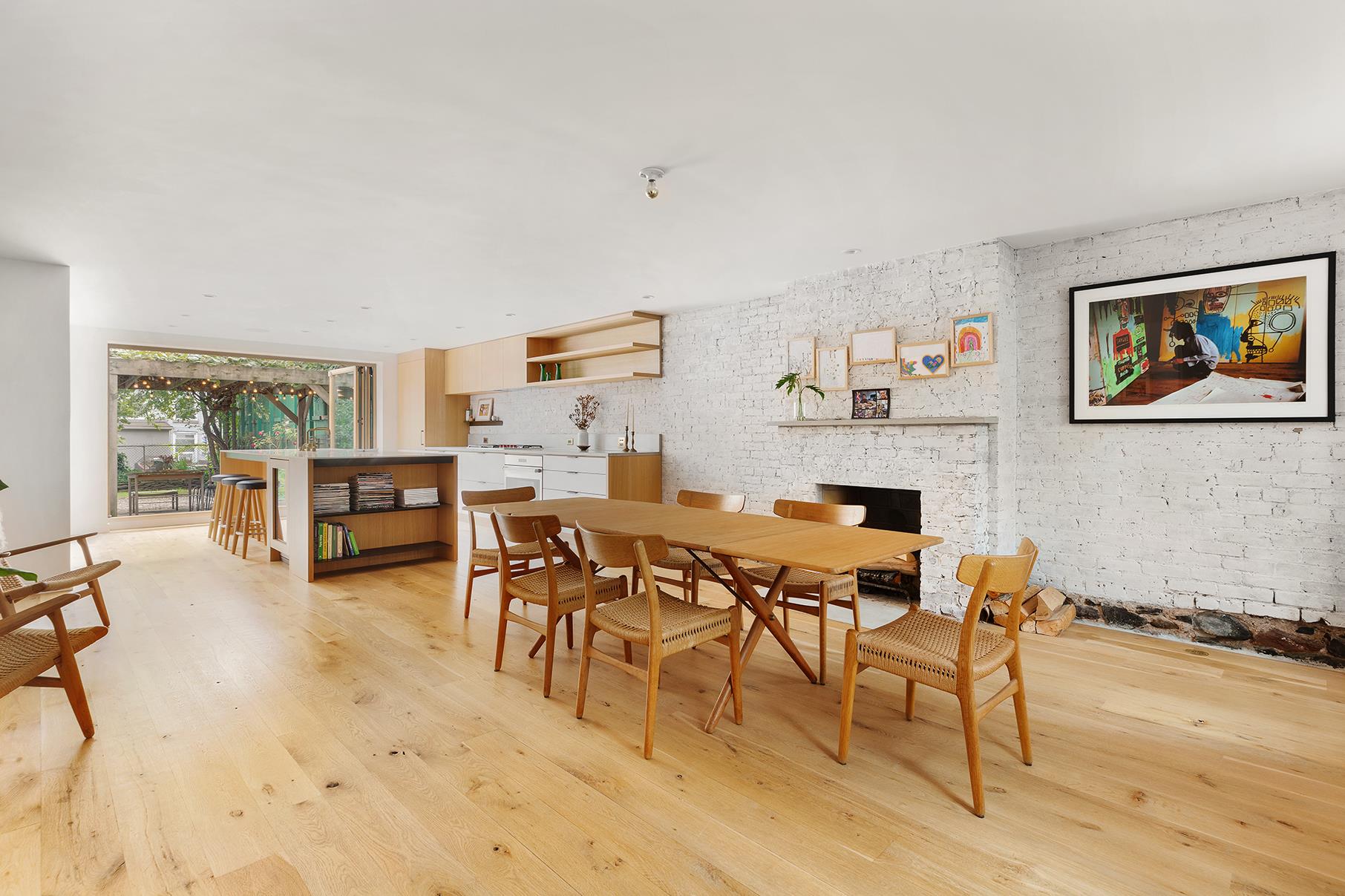 28 2nd Street Brooklyn, NY 11231 - Photo 1 of 1 a dining room with furniture and a floor to ceiling window