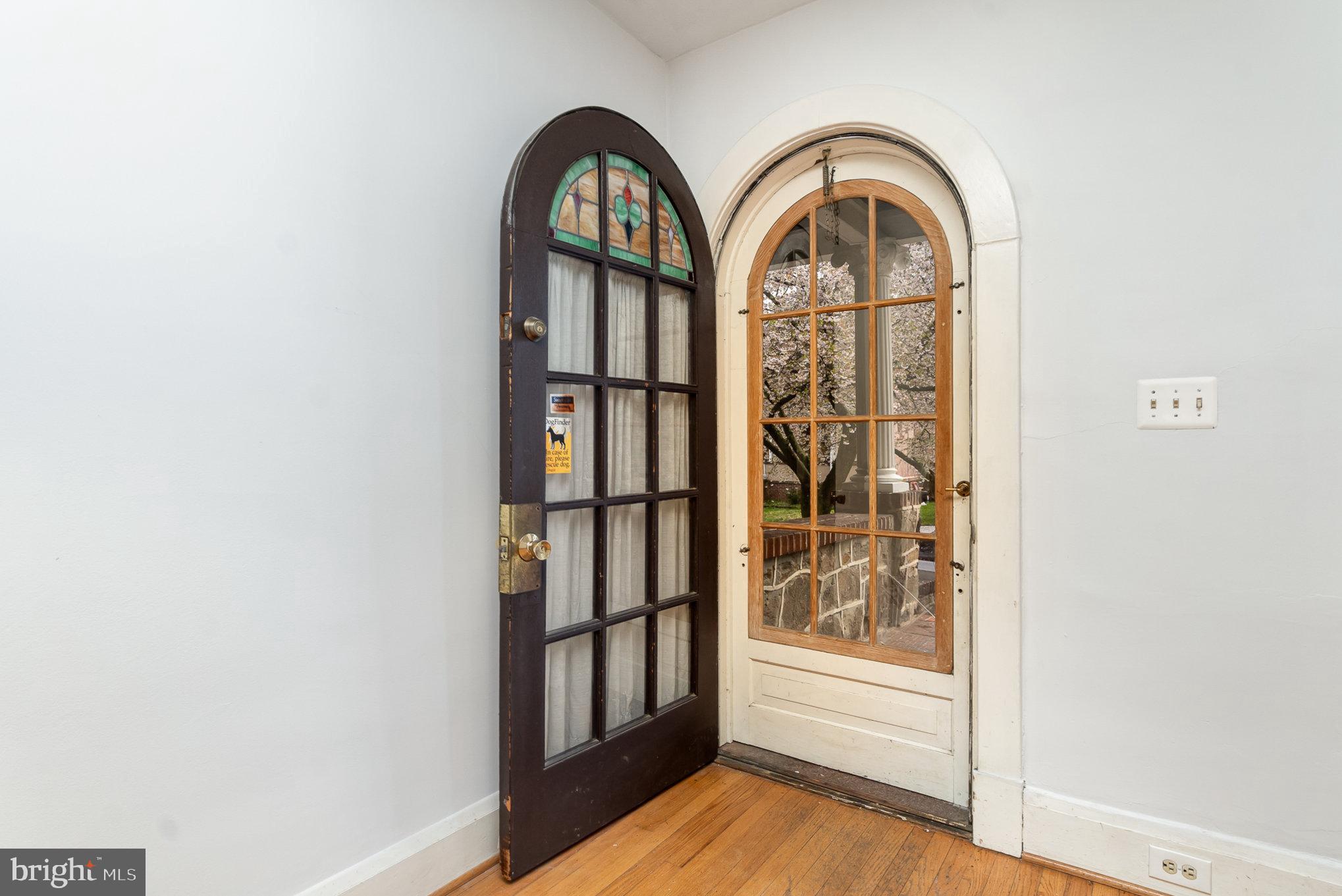 3014 Beverly Road Baltimore, MD 21214 - Photo 4 of 41 Classic Arched Door with Stain Glass
