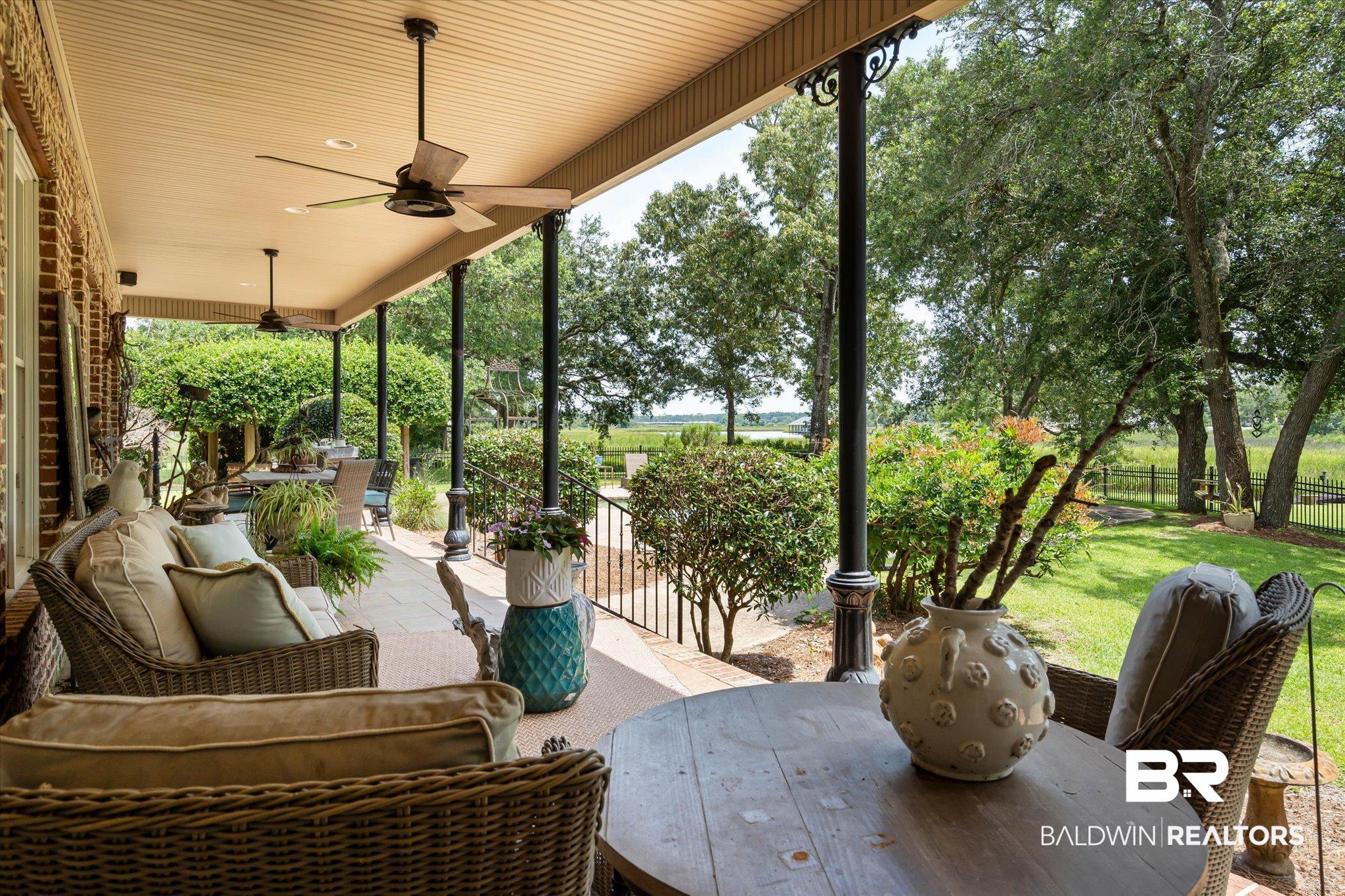 2905 Riverview Pointe Drive South Theodore, AL 36582 - Photo 24 of 44 View of patio / terrace featuring outdoor dining space and ceiling fan