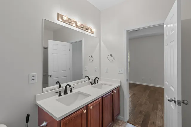 a bathroom with a glass shower door