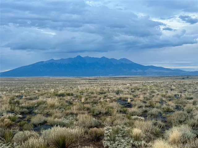 an aerial view of residential building and green space