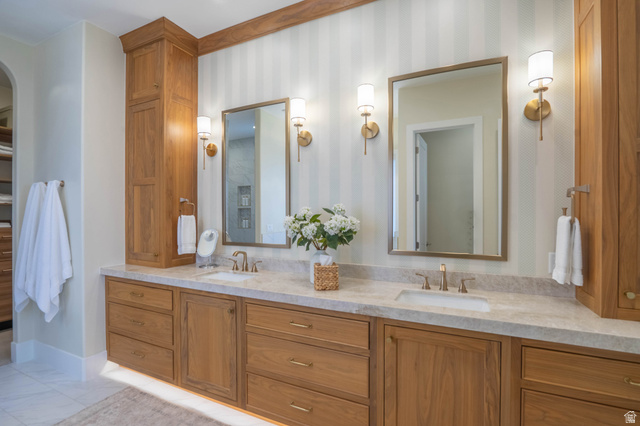 3166 South Tallow Tree Drive St. George, UT 84790 - Photo 17 of 32 Dual vanity with light wood cabinetry and integrated sinks
