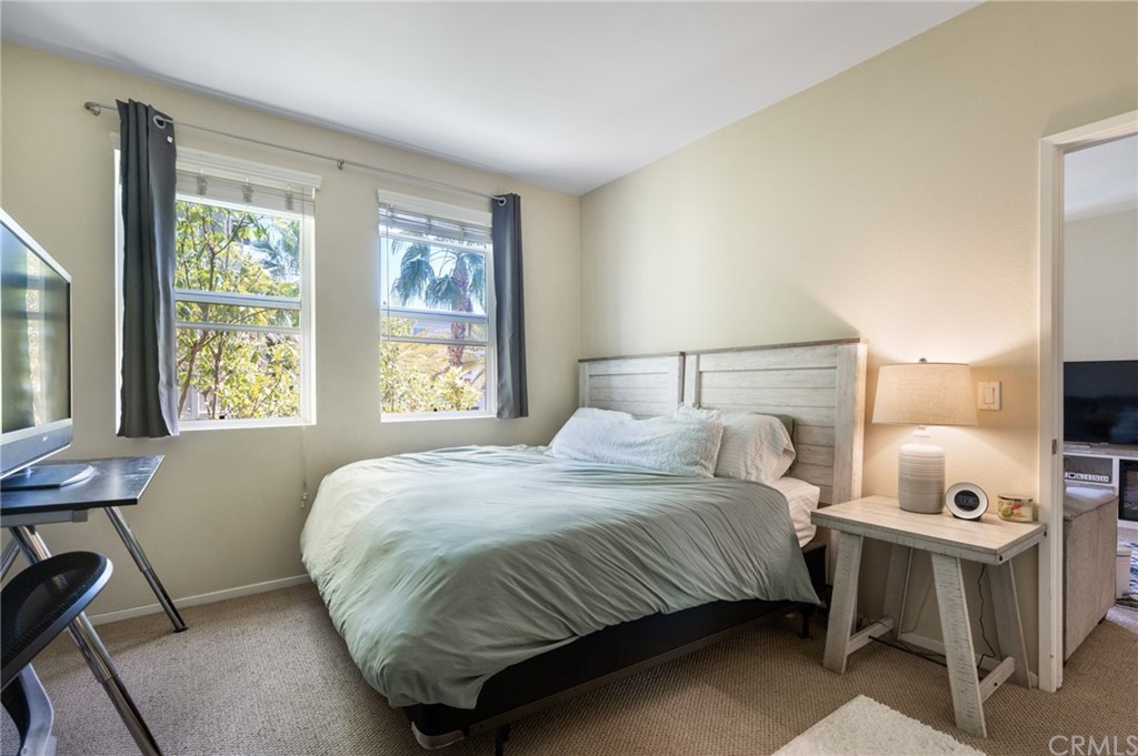 2321 Scholarship Irvine, CA 92612 - Photo 14 of 34 a bedroom with a bed and a window