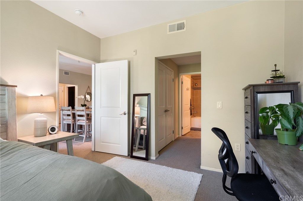 2321 Scholarship Irvine, CA 92612 - Photo 15 of 34 a bedroom with furniture and a window