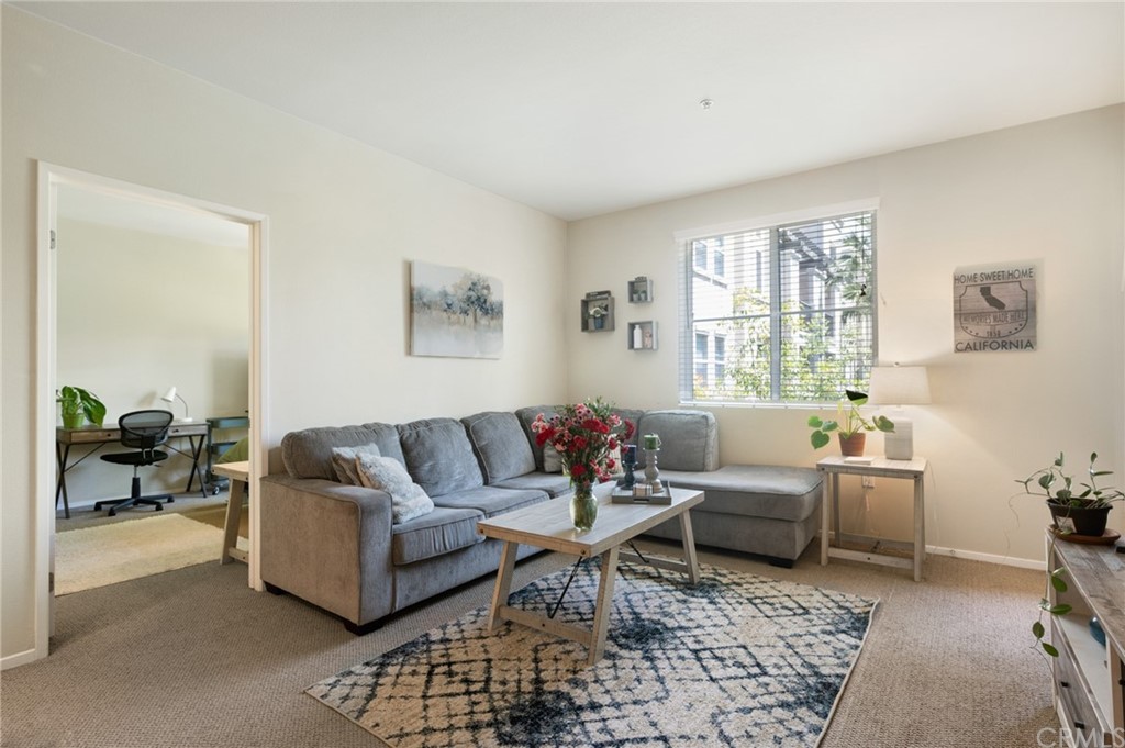 2321 Scholarship Irvine, CA 92612 - Photo 17 of 34 a living room with furniture and a window