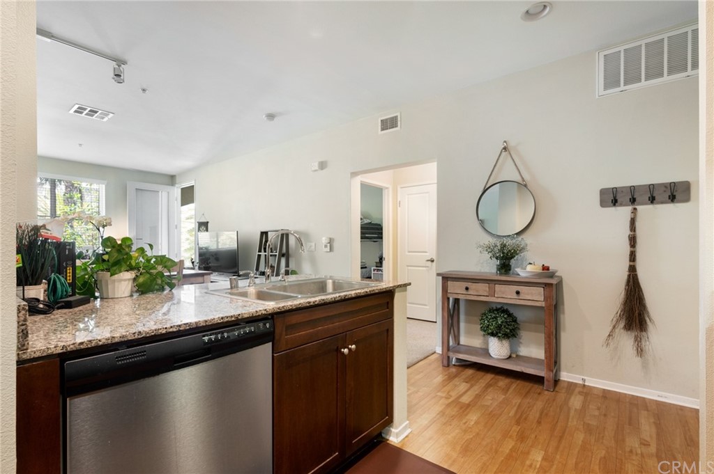 2321 Scholarship Irvine, CA 92612 - Photo 19 of 34 a kitchen with sink and stove