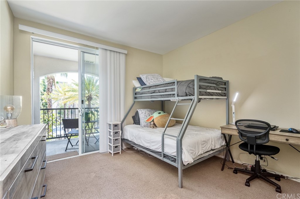 2321 Scholarship Irvine, CA 92612 - Photo 21 of 34 a bedroom with a bed and a desk