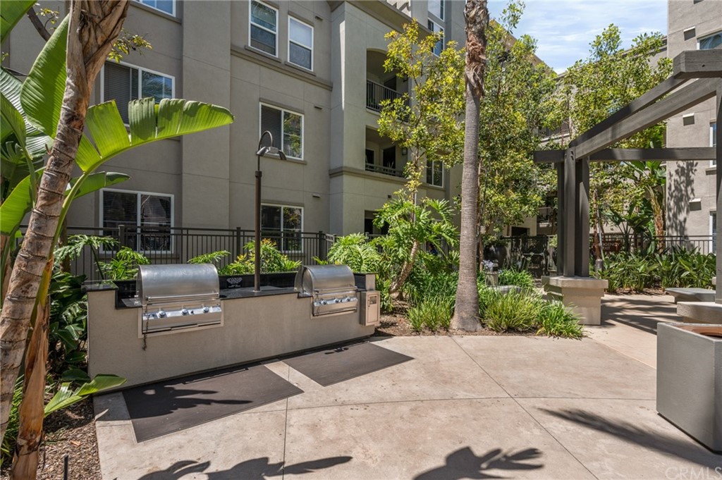 2321 Scholarship Irvine, CA 92612 - Photo 27 of 34 a view of a building with a garden