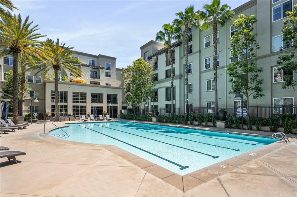 2321 Scholarship Irvine, CA 92612 - Photo 28 of 34 a view of a tall building next to a yard