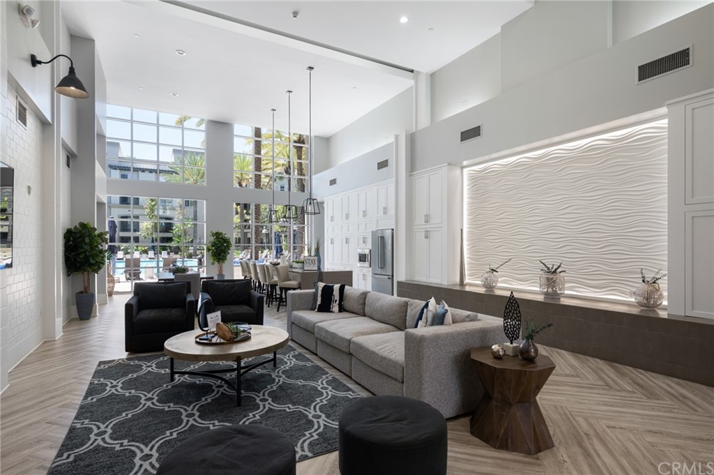 2321 Scholarship Irvine, CA 92612 - Photo 32 of 34 a living room with furniture and a large window