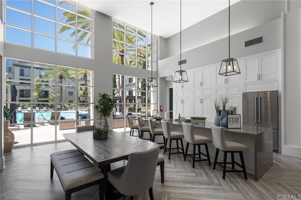 2321 Scholarship Irvine, CA 92612 - Photo 33 of 34 a view of a dining room with furniture window and wooden floor