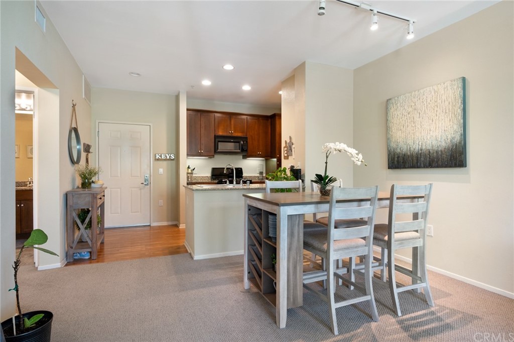 2321 Scholarship Irvine, CA 92612 - Photo 6 of 34 a kitchen with a table and chairs in it
