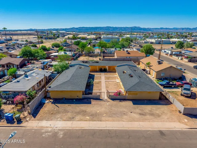 an aerial view of a tennis ground and a terrace view