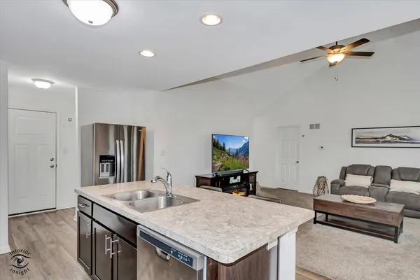 a living room with dining table