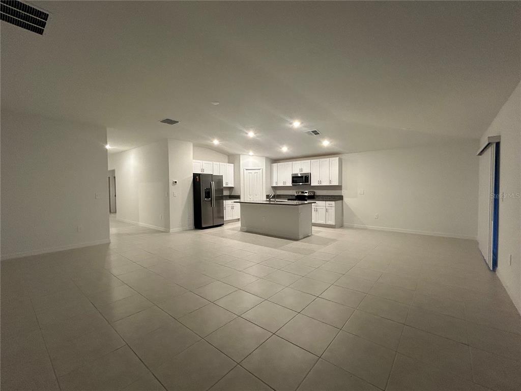 13095 Calcite Blue Avenue Wimauma, FL 33598 - Photo 7 of 28 a view of kitchen appliances with cabinets