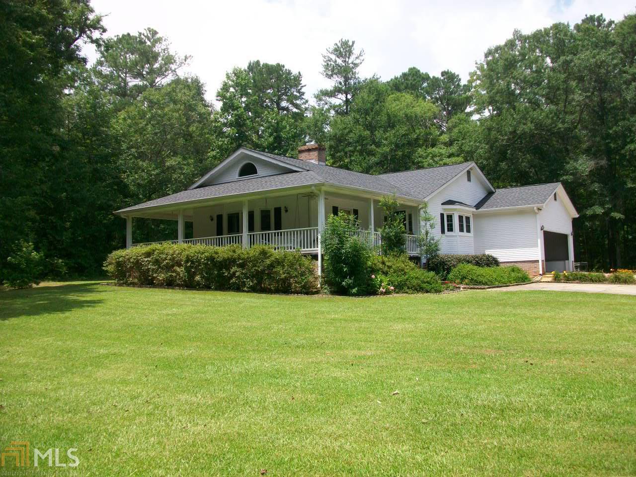 779 Zebulon Road Zebulon, GA 30295 - Photo 1 of 1 a front view of a house with a yard