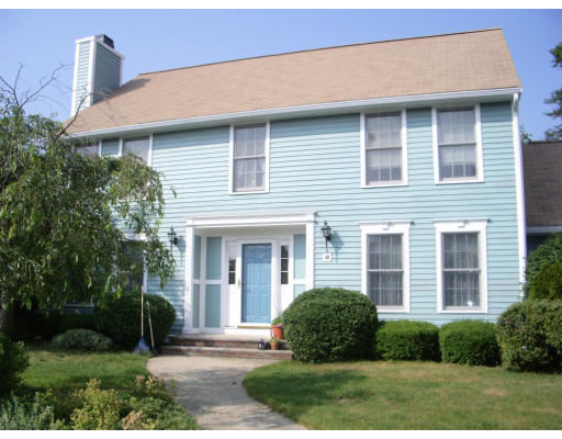 18 Old Town Road Beverly, MA 01915 - Photo 1 of 18 a front view of a house with a yard and garage