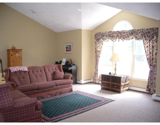 18 Old Town Road Beverly, MA 01915 - Photo 11 of 18 a living room with furniture and a large window