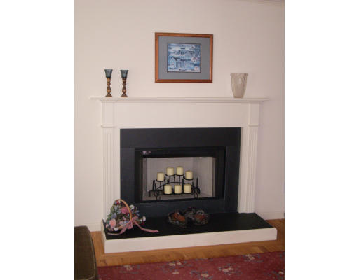 18 Old Town Road Beverly, MA 01915 - Photo 12 of 18 a living room with furniture and a fireplace