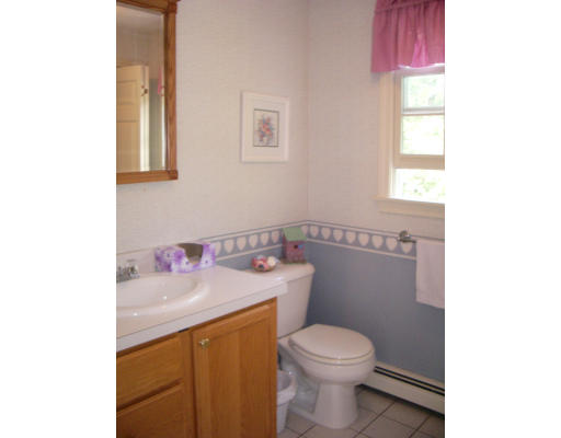 18 Old Town Road Beverly, MA 01915 - Photo 14 of 18 a bathroom with a sink toilet and window