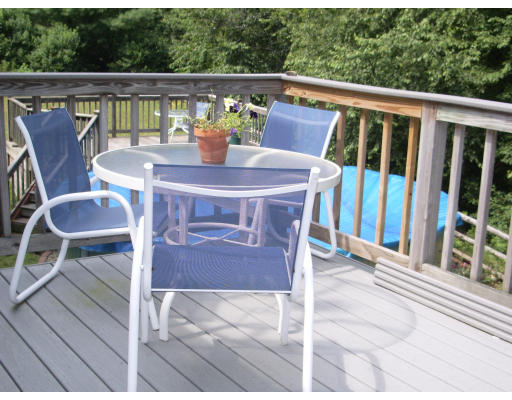 18 Old Town Road Beverly, MA 01915 - Photo 17 of 18 a view of roof deck with furniture and trees