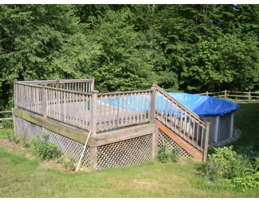 18 Old Town Road Beverly, MA 01915 - Photo 5 of 18 a view of a deck with a fence