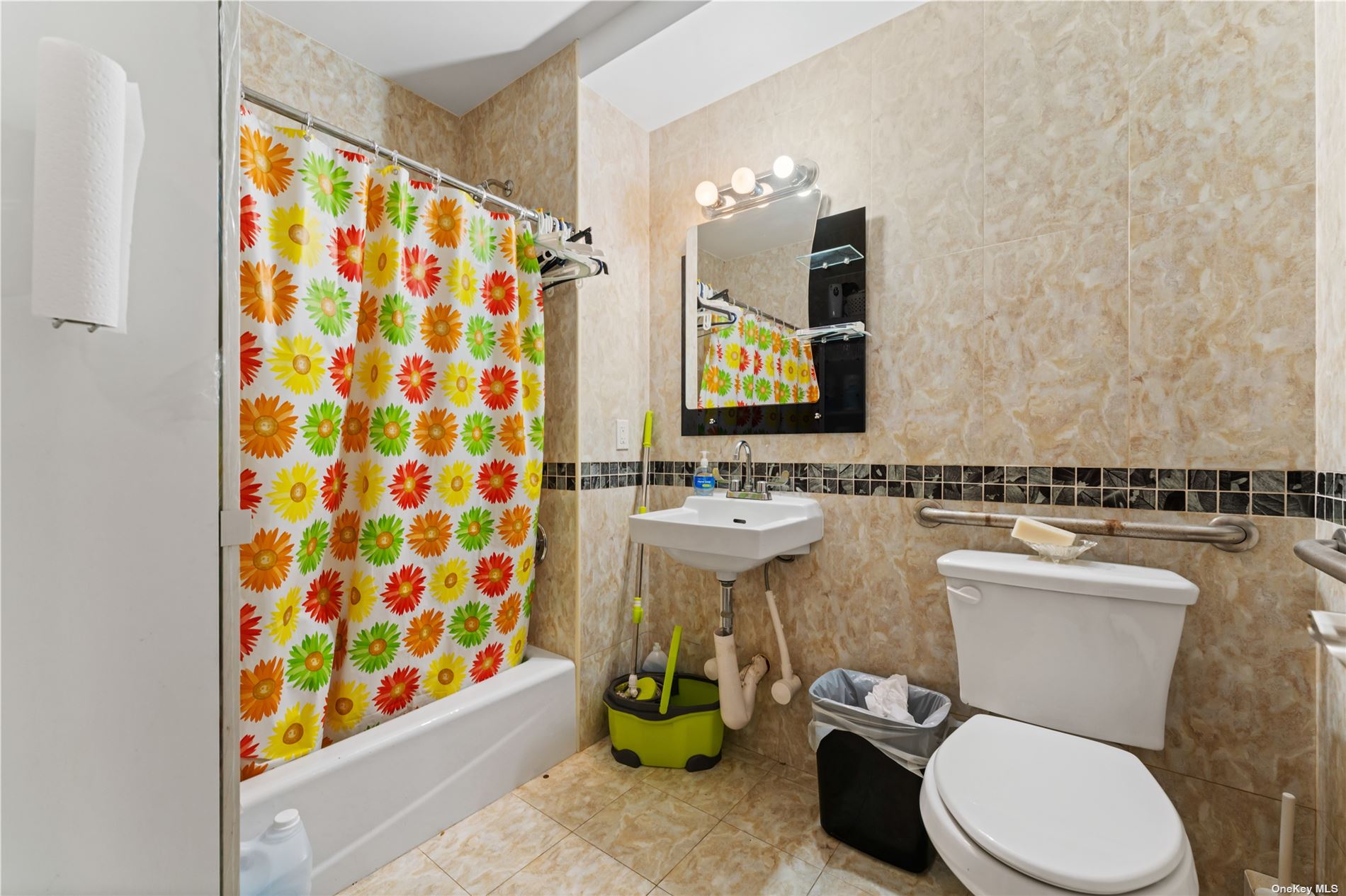 53-12 102nd Street Queens, NY 11368 - Photo 11 of 20 a bathroom with a sink toilet and shower