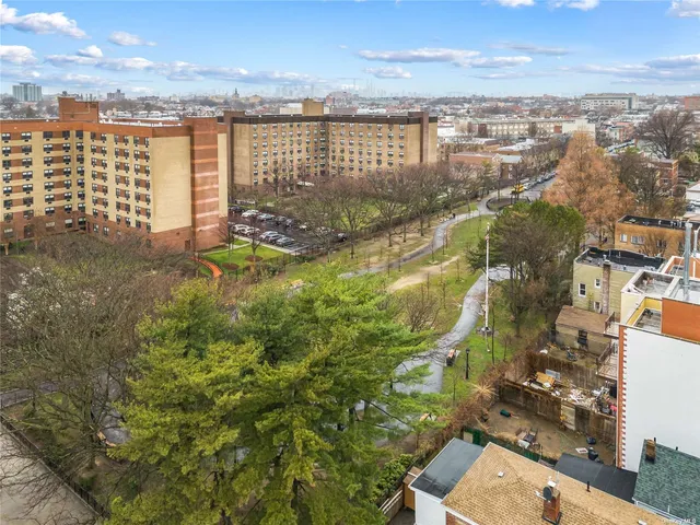 an aerial view of residential building with parking space