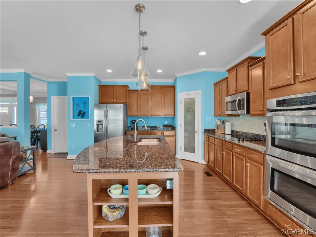 2842 Bayfront Way Midlothian, VA 23112 - Photo 21 of 50 a kitchen with stainless steel appliances granite countertop a stove and cabinets