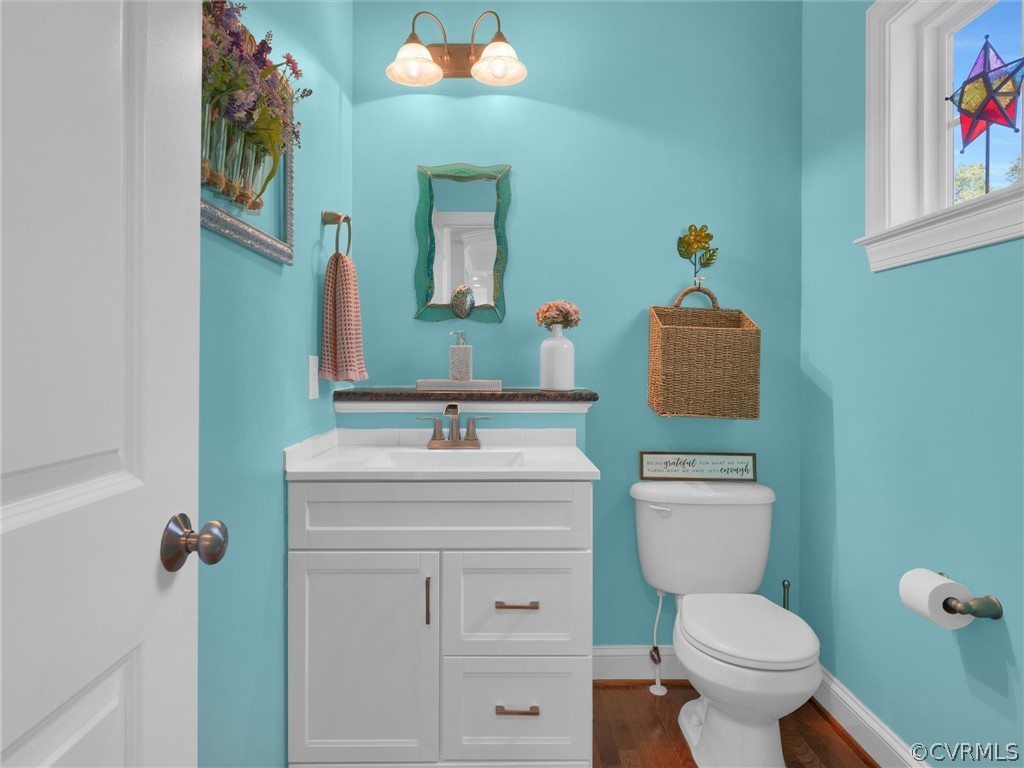 2842 Bayfront Way Midlothian, VA 23112 - Photo 22 of 50 a bathroom with a toilet sink and mirror