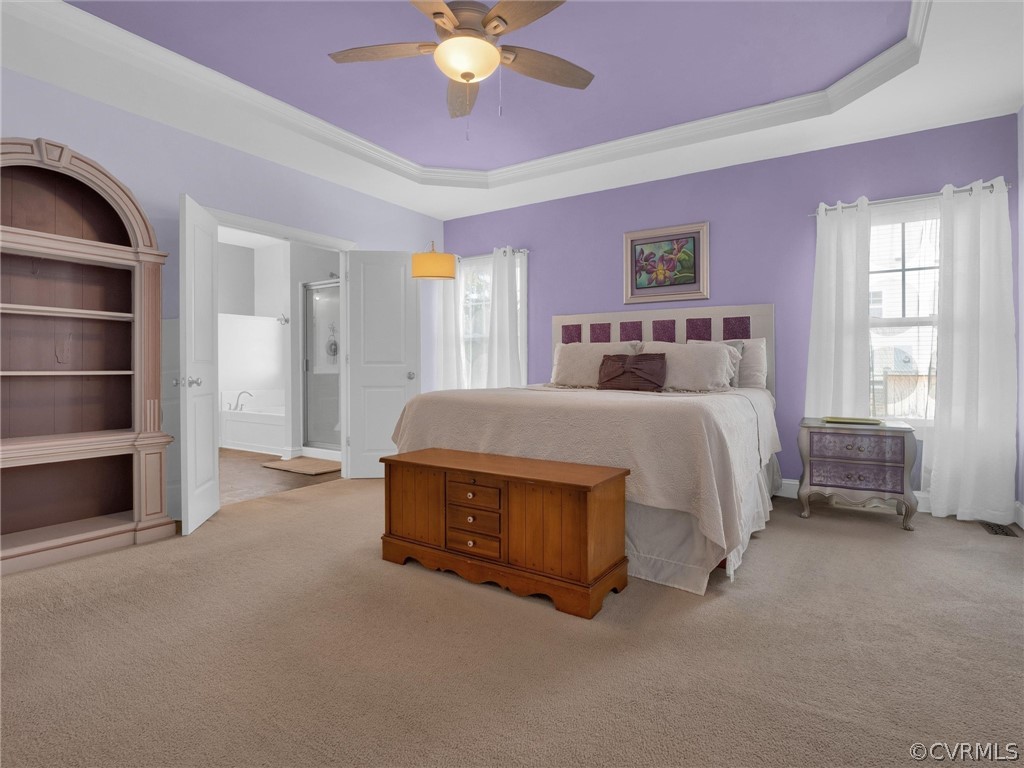 2842 Bayfront Way Midlothian, VA 23112 - Photo 24 of 50 a spacious bedroom with a bed and a chandelier