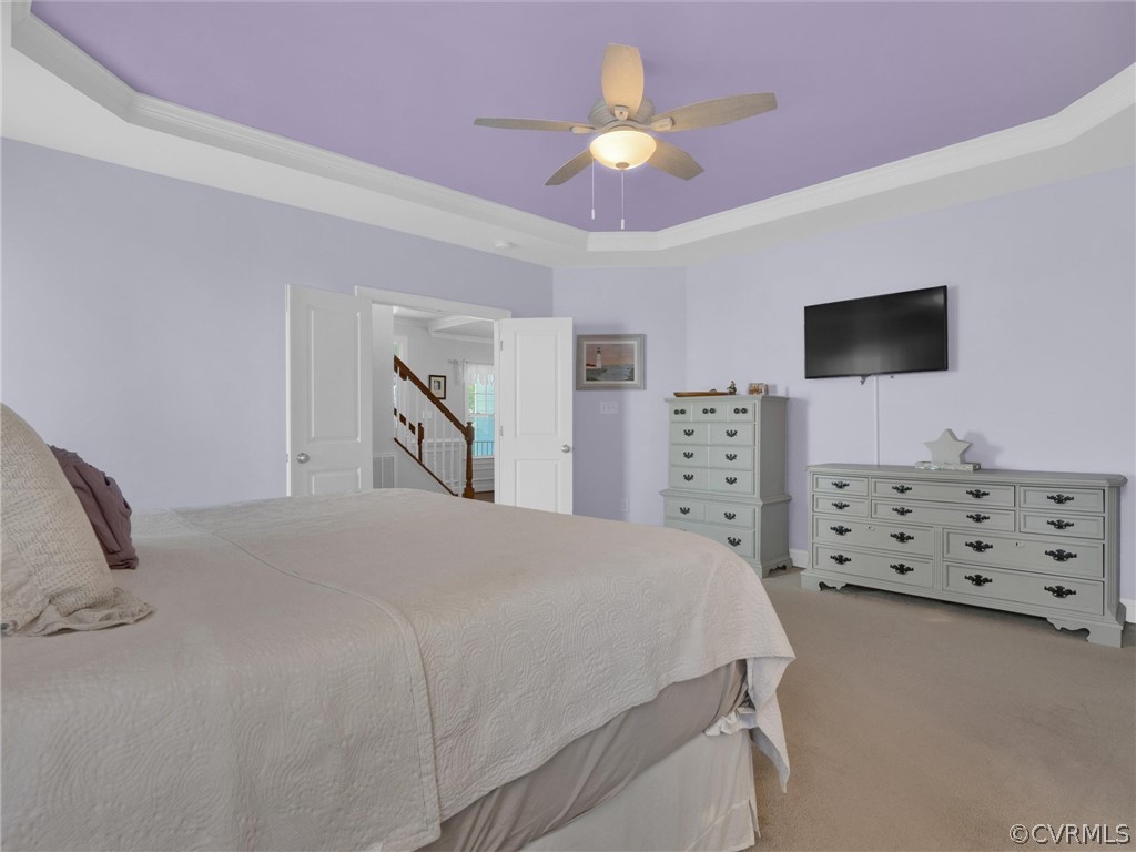 2842 Bayfront Way Midlothian, VA 23112 - Photo 25 of 50 a spacious bedroom with a bed and a flat screen tv