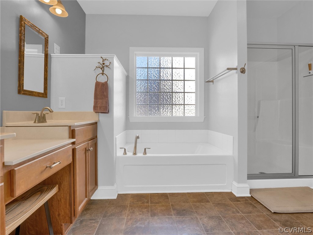 2842 Bayfront Way Midlothian, VA 23112 - Photo 28 of 50 a spacious bathroom with a bathtub and a sink