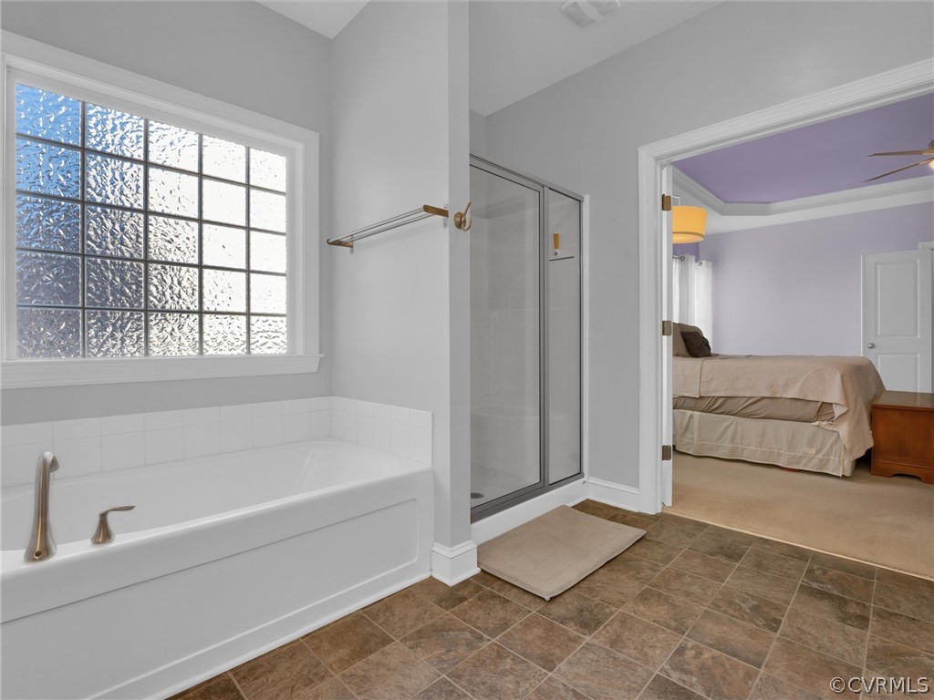 2842 Bayfront Way Midlothian, VA 23112 - Photo 29 of 50 a bathroom with a bathtub and a shower