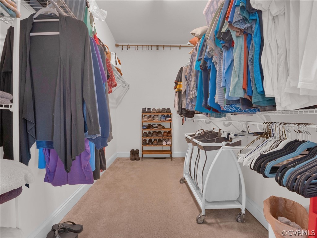 2842 Bayfront Way Midlothian, VA 23112 - Photo 31 of 50 a view of walk in closet with clothes and shoes