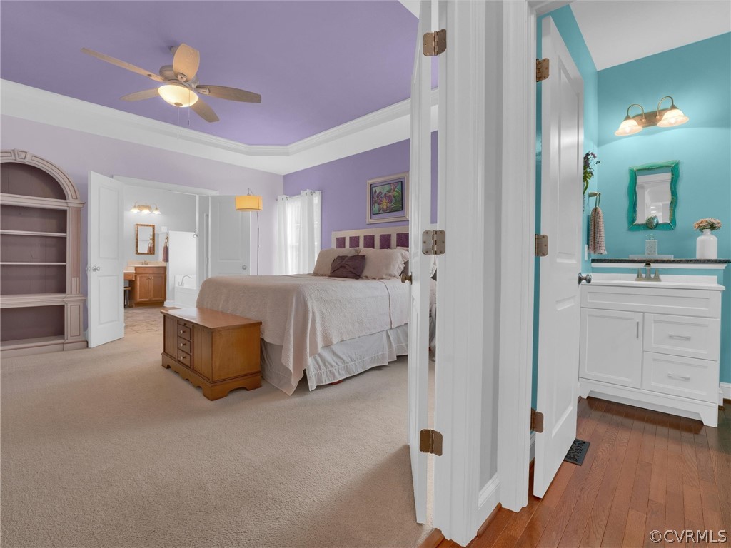 2842 Bayfront Way Midlothian, VA 23112 - Photo 33 of 50 a bedroom with a bed and a chandelier