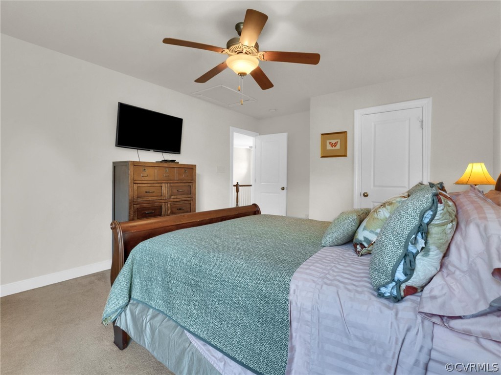 2842 Bayfront Way Midlothian, VA 23112 - Photo 40 of 50 a bedroom with a bed and a flat screen tv