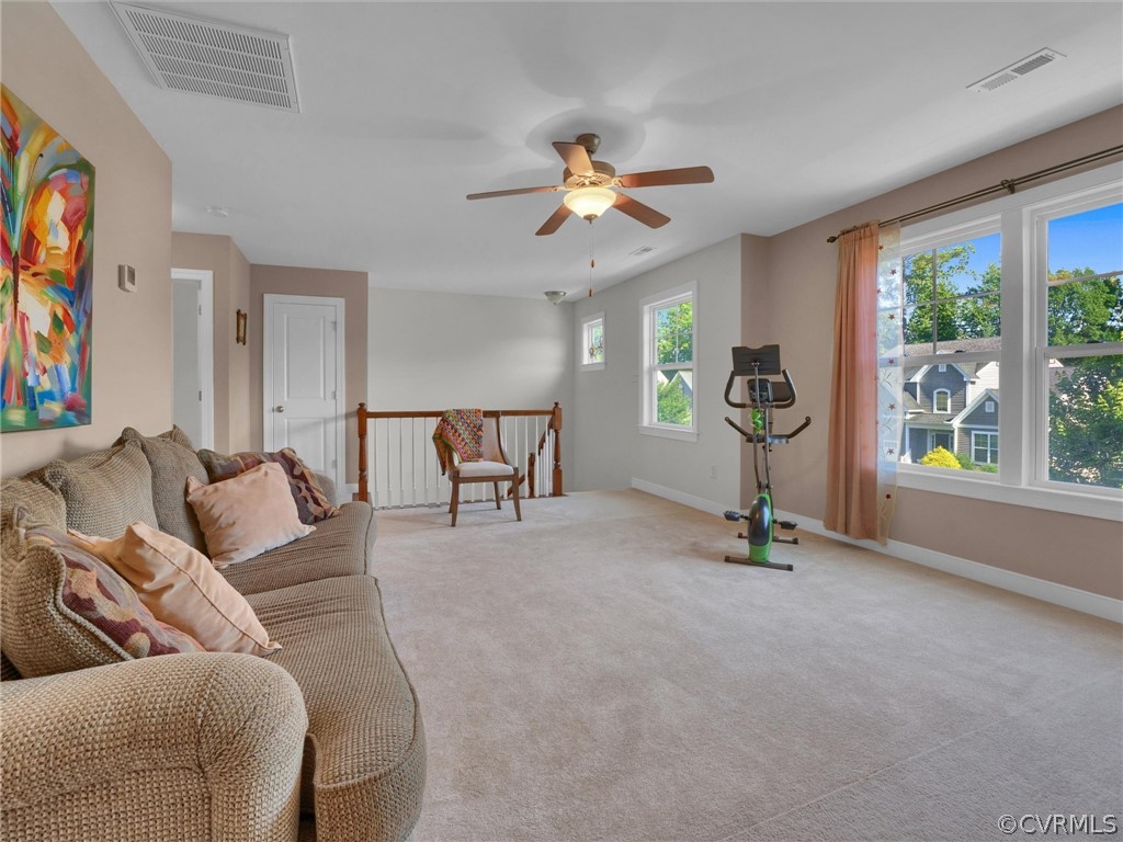 2842 Bayfront Way Midlothian, VA 23112 - Photo 42 of 50 a living room with furniture and a large window