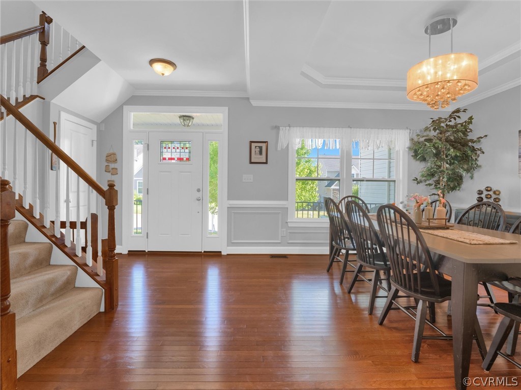 2842 Bayfront Way Midlothian, VA 23112 - Photo 6 of 50 a view of a dining room with furniture and wooden floor
