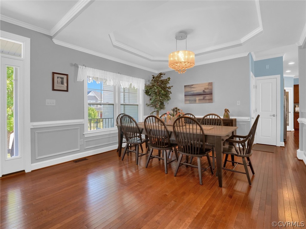 2842 Bayfront Way Midlothian, VA 23112 - Photo 8 of 50 a view of a dining room with furniture window and wooden floor