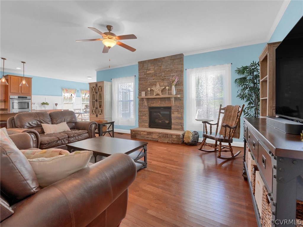 2842 Bayfront Way Midlothian, VA 23112 - Photo 9 of 50 a living room with furniture fireplace and flat screen tv